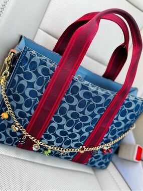 ISO Coach Denim Signature Tote with Red Striped Handles and Gold Charm Chain